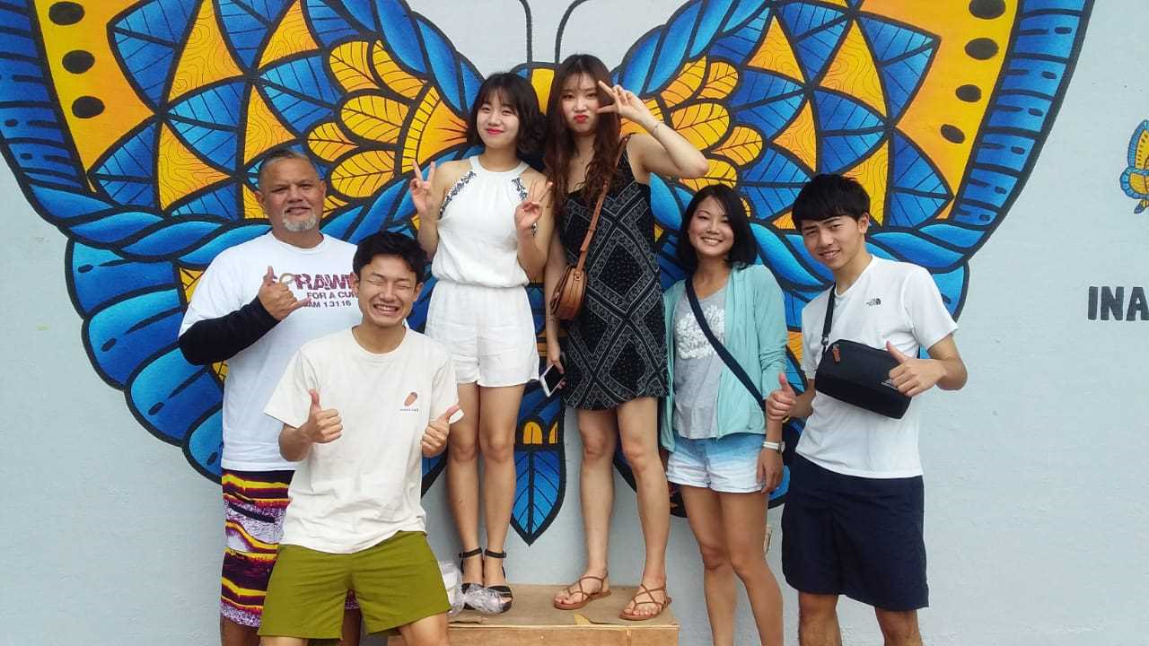 Ryoga Okada and Ichiyo Kawamata at arrival with 3 female UOG members of the English Language Institute who arrived at the same time