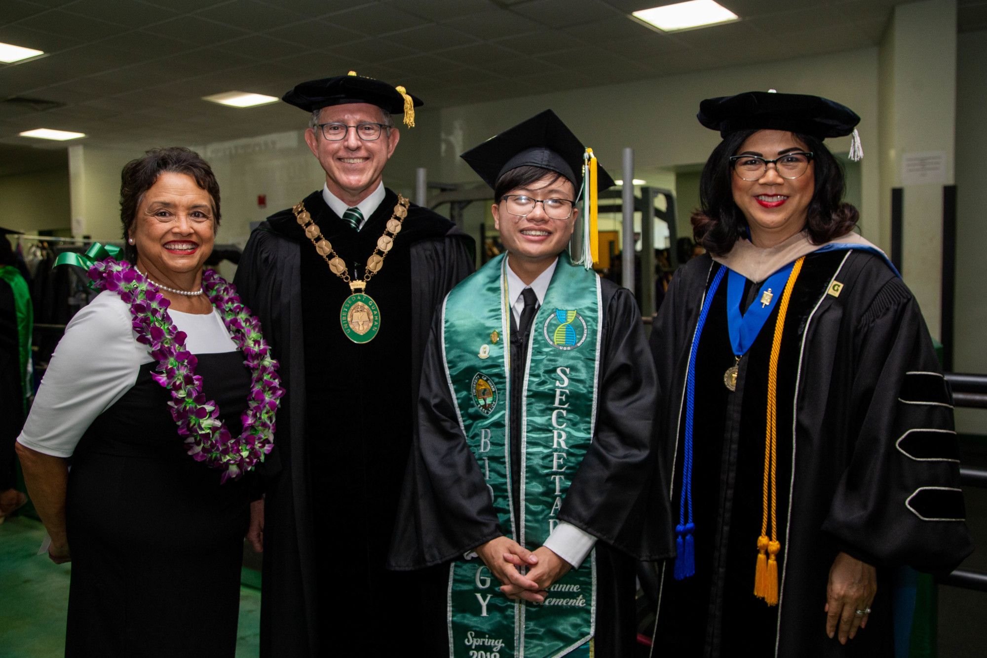 (From left) Gov. Lou Leon Guerrero; President Thomas W. Krise; Seanne R. Clemente; Anita B. Enriquez