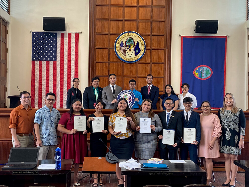 Nolan Flores stands with other members of the Guam Youth Congress.