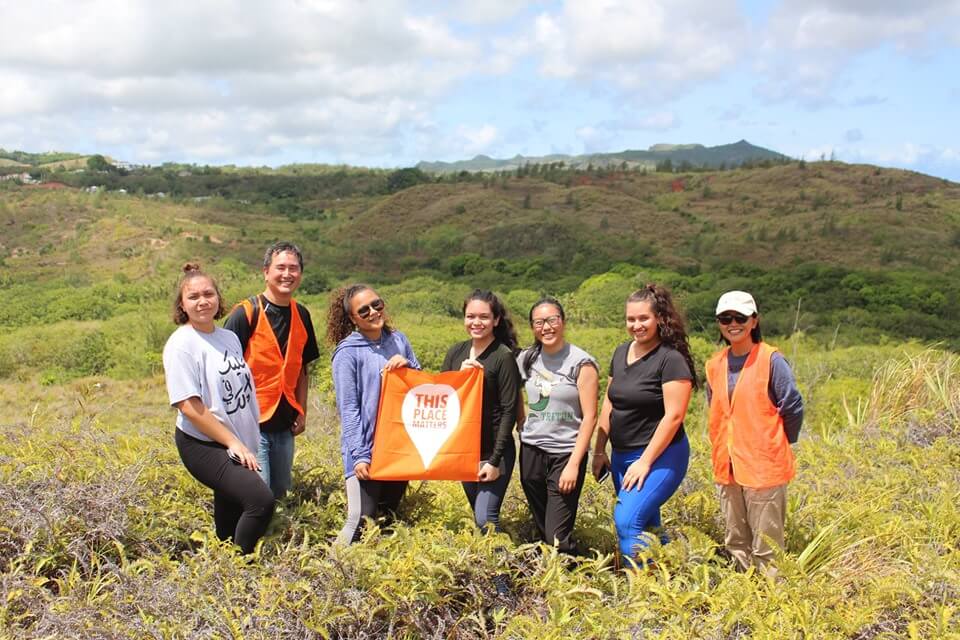 Perez, center, joins fellow students in volunteering for the Atantano Heritage Trail-Making Project