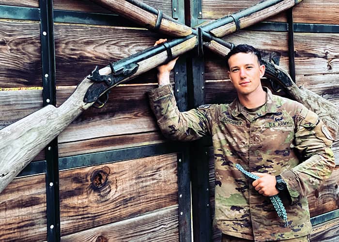 Michael Schommer holding the infantry blue cord