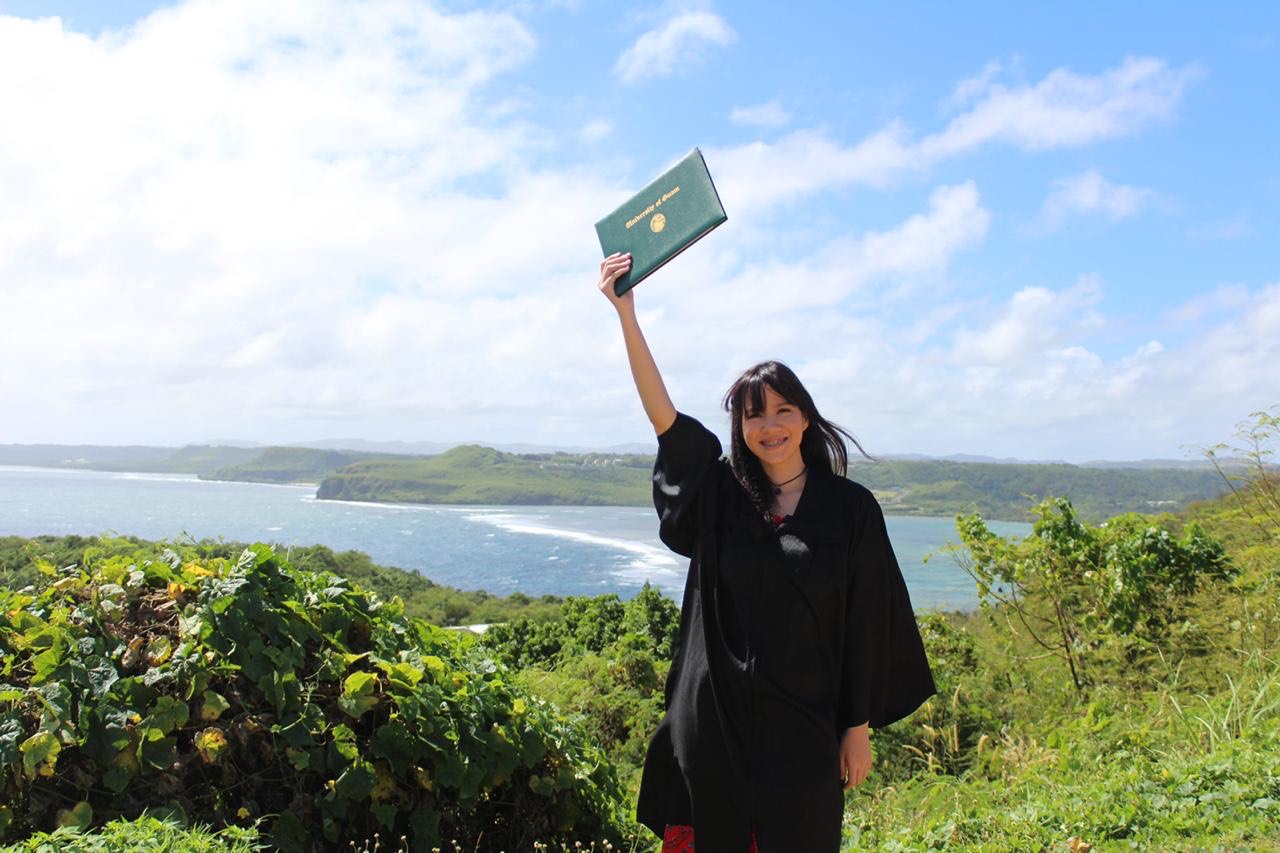 Photo of Maya Nanpei in graduation gown