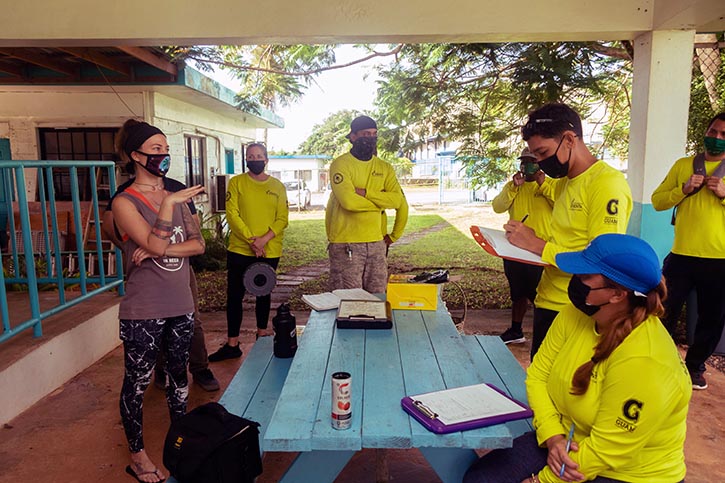 Photo of G3 Conservation Corps participating in a hands-on energy survey