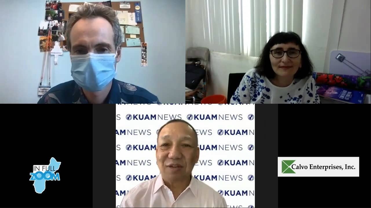 Dr. Rasmussen with KUAM's Nestor Licanto