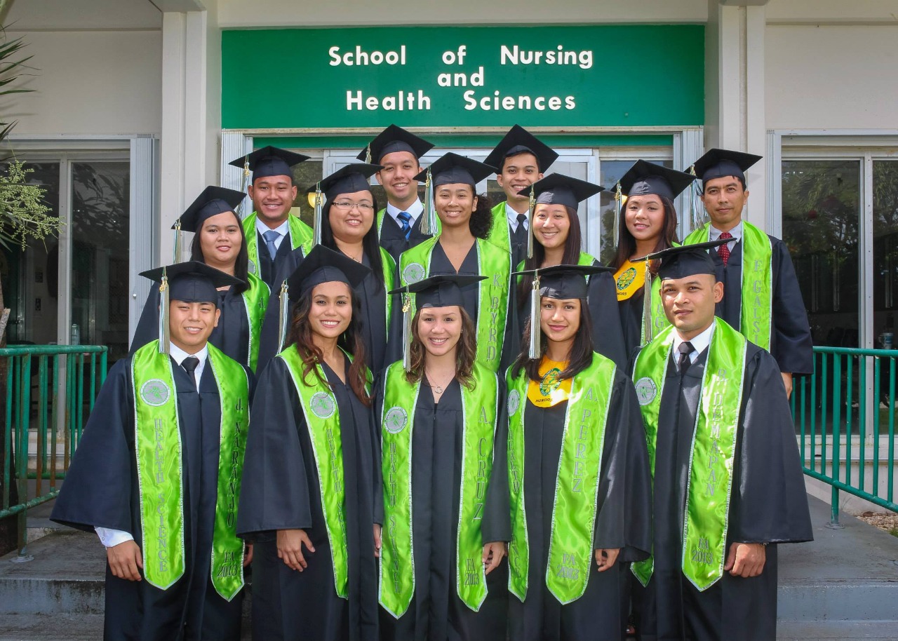 Julius Naranjo and his fellow graduates