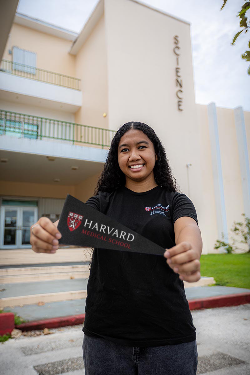 Megan Gimmen stands outside the Science Building on the University of Guam campus. 