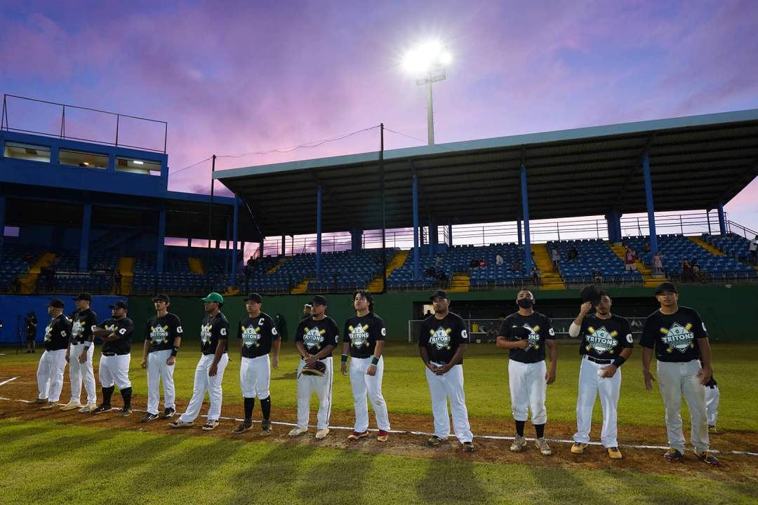 Group photo at baseball field