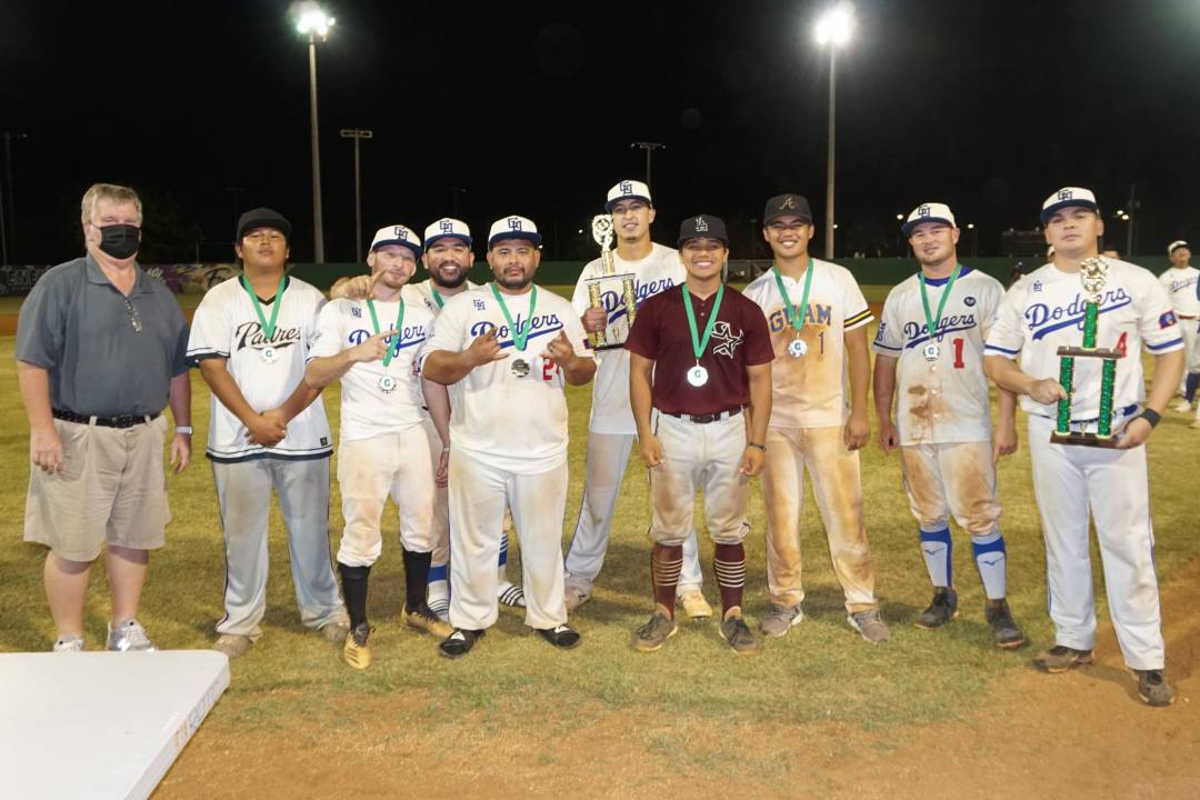 Group photo at baseball field