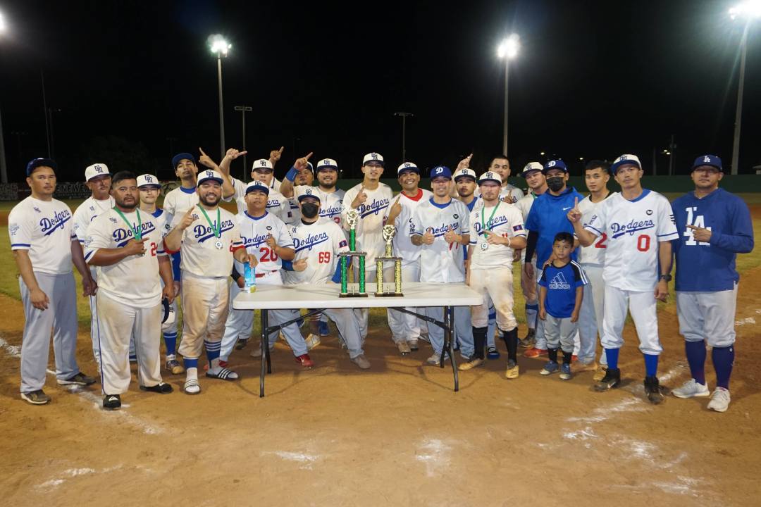 Group photo at baseball field