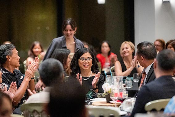 Guests applaud during the 2022 UOG Distinguished Alumni Awards ceremony.