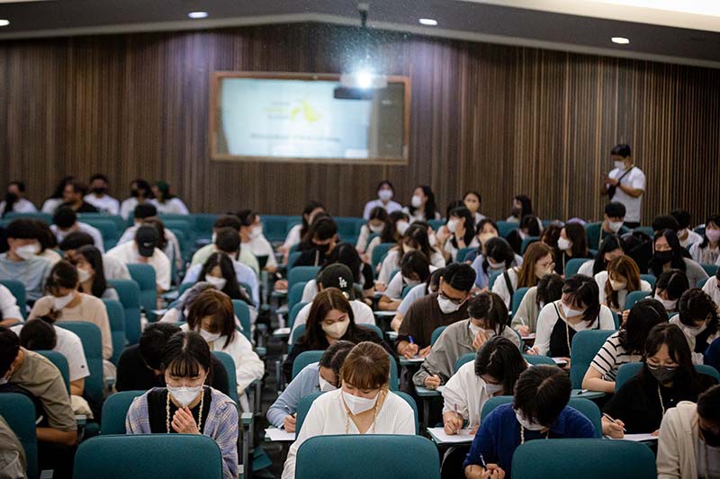 Students from various South Korean universities take an assessment