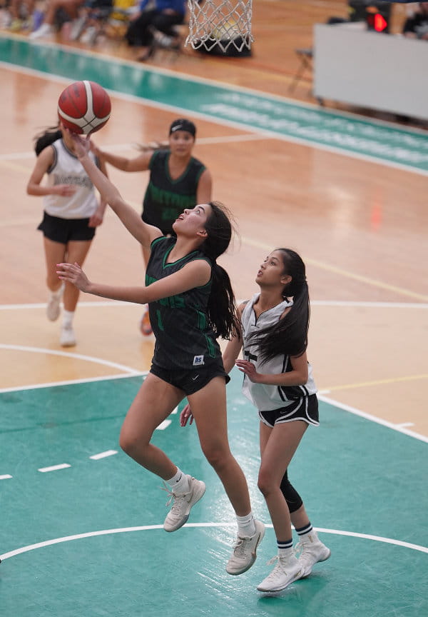 Lady Tritons’ Cori-Nicole Paulino goes up for a layup.