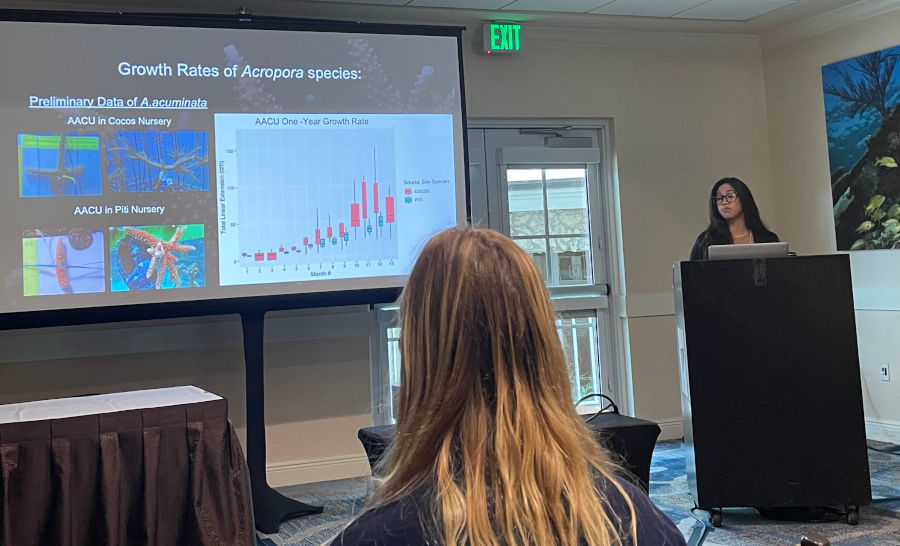 Ashley Castro, UOG Marine Lab restoration technician, presents her work