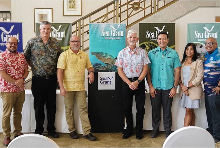 Members of of UOG, Hawaii, and national Sea Grant programs pose for a photo after press conference.