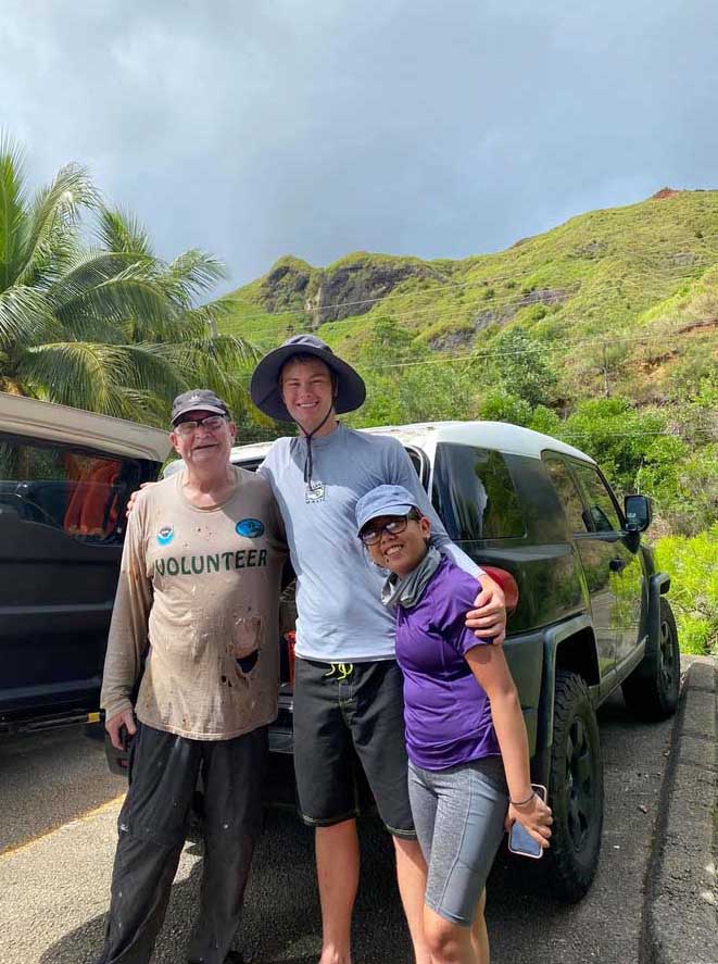 Photo of Hunter Sidell with his professor and classmate after fieldwork