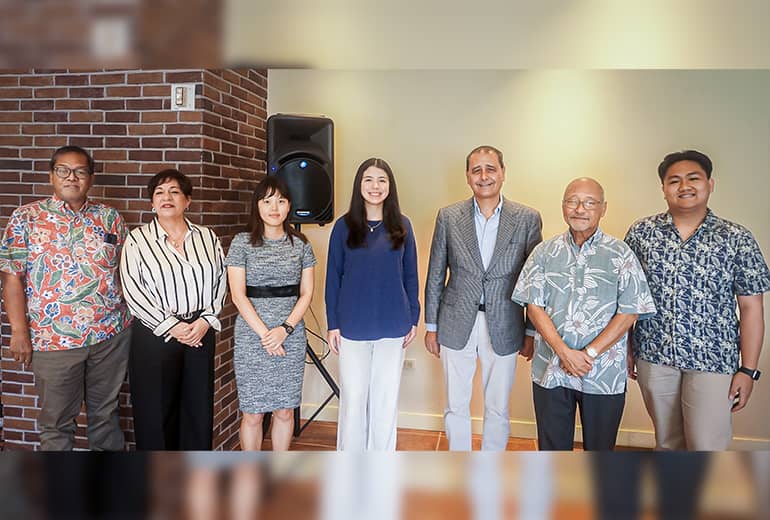 Group photo of scholarship awardees and members of UOG's admin and faculty