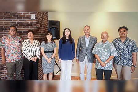 Group photo of scholarship awardees and members of UOG's admin and faculty