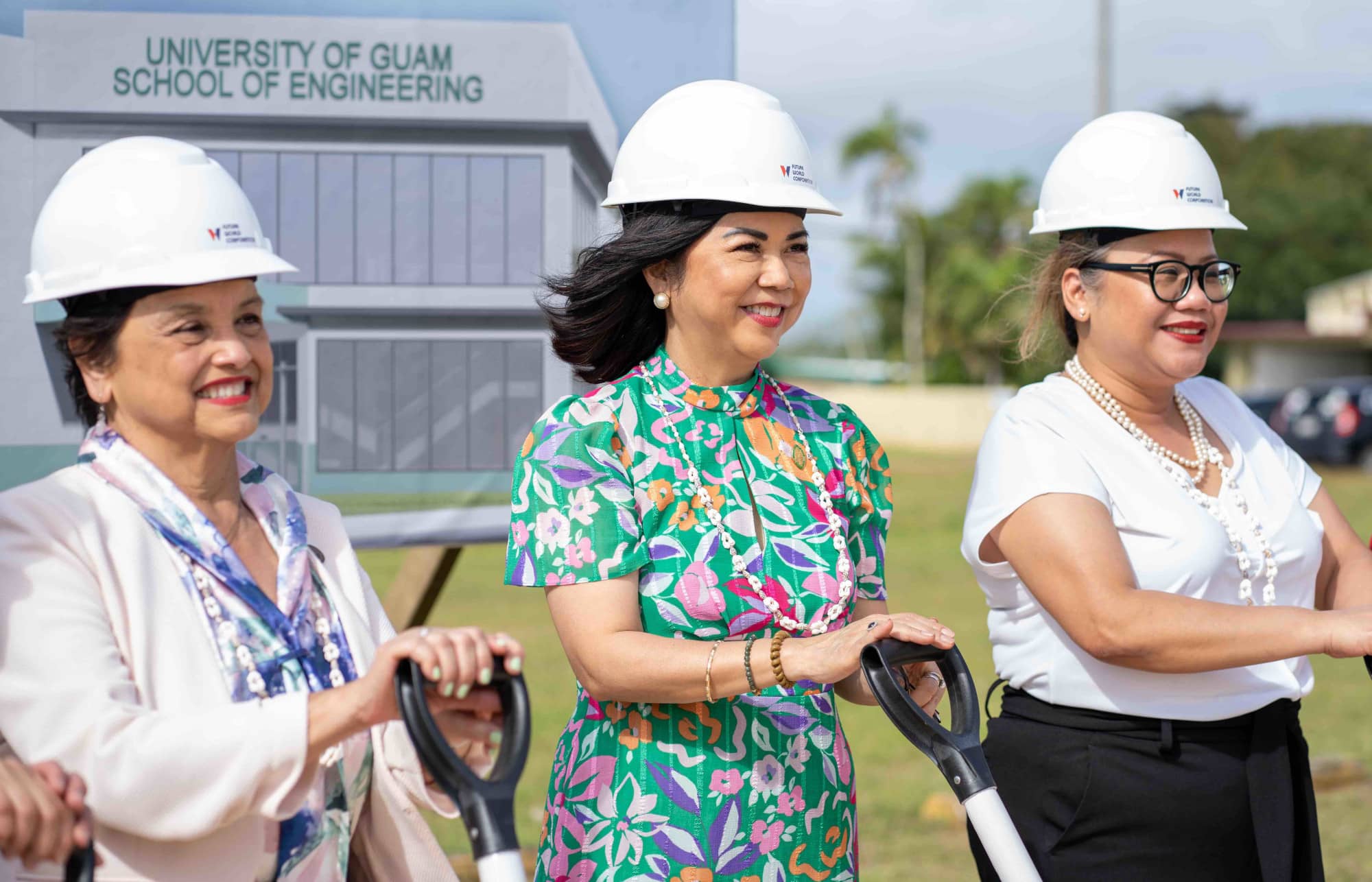 President Enriquez, Gov. Lou Leon Guerrero, SVP Dr. Sharleen Santos-Bamba 