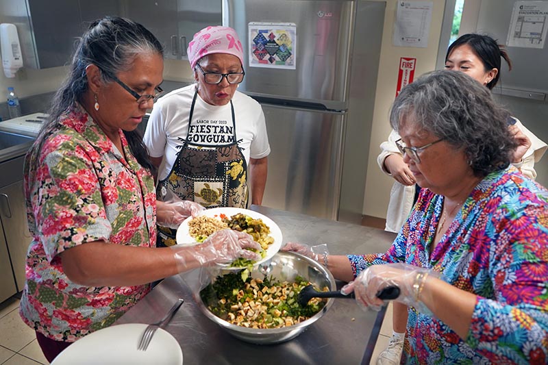 Photo of women cooking a healthy meal