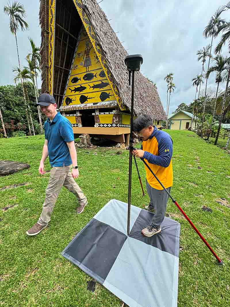 Image of Thomas Torres setting up a drone base station