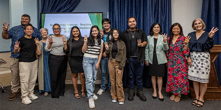 UOG admin and students/PNNL interns pose for a photo