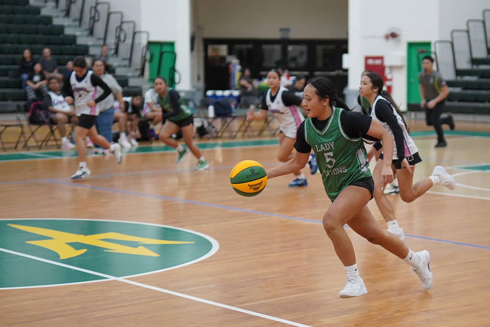 Lady Tritons Playing Basketball