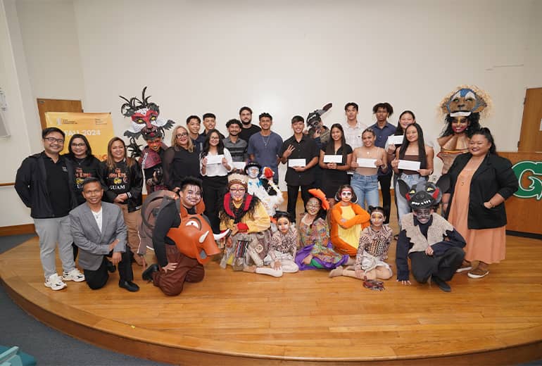 Student athletes and WTP and GPF representatives pose for a group photo at lecture hall