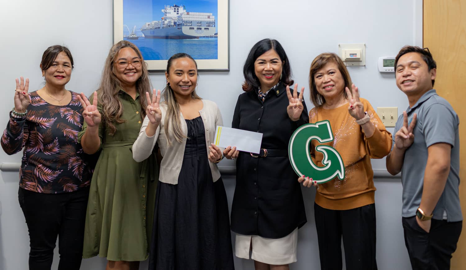 AGA Guam Chapter awarded $1,500 Herminia Dierking Scholarships to UOG students Abigail UY and Princess Fernandez.