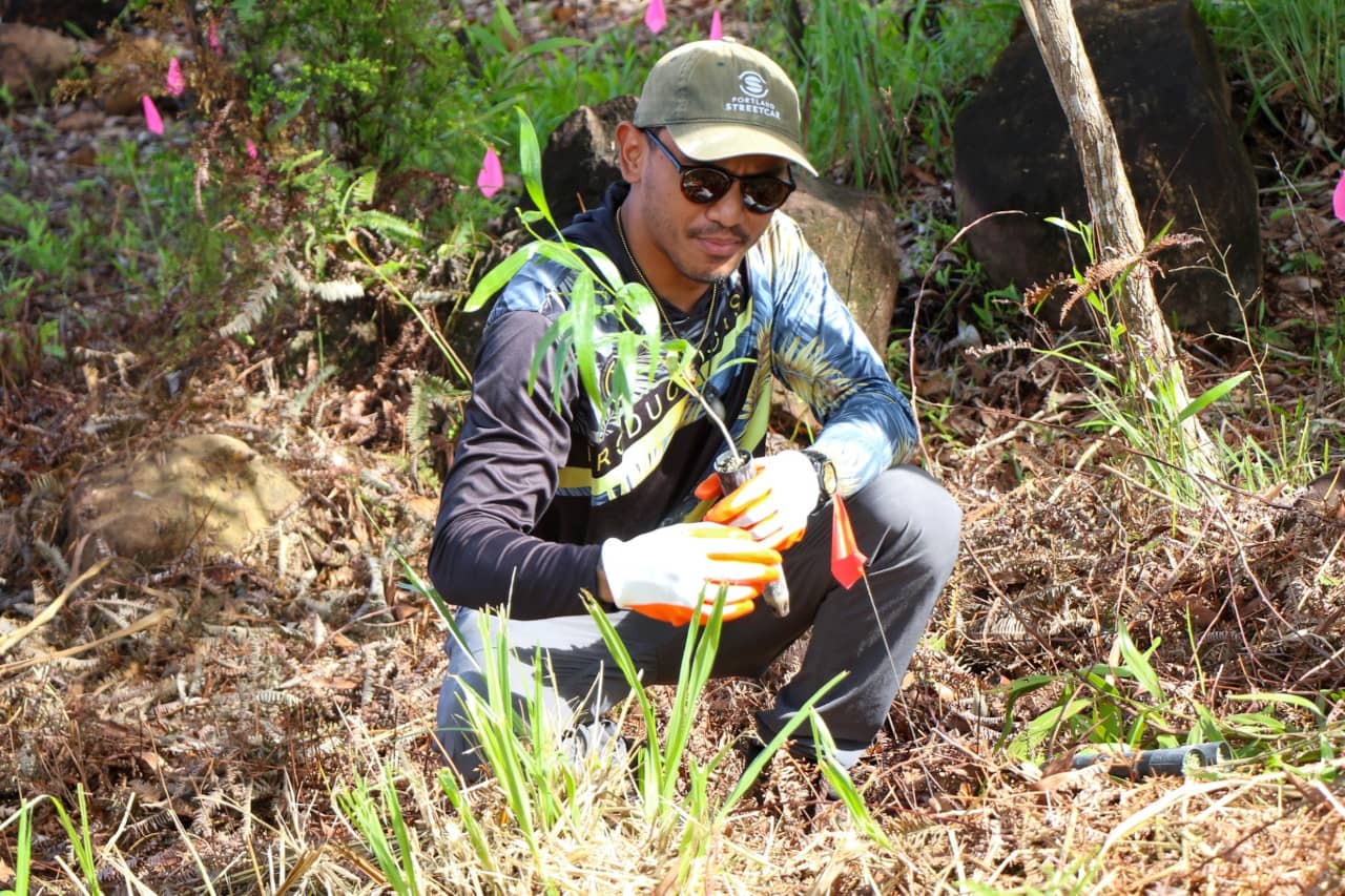 Volunteer Josh Laurente joined GROW’s event, planting 1,600 trees to reduce erosion.