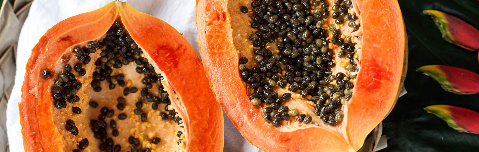 Photo of a ripe papaya cut in half